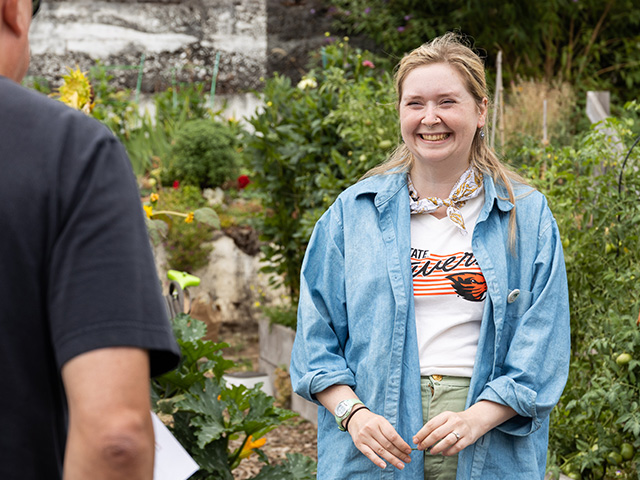 gardener talking to filming staff